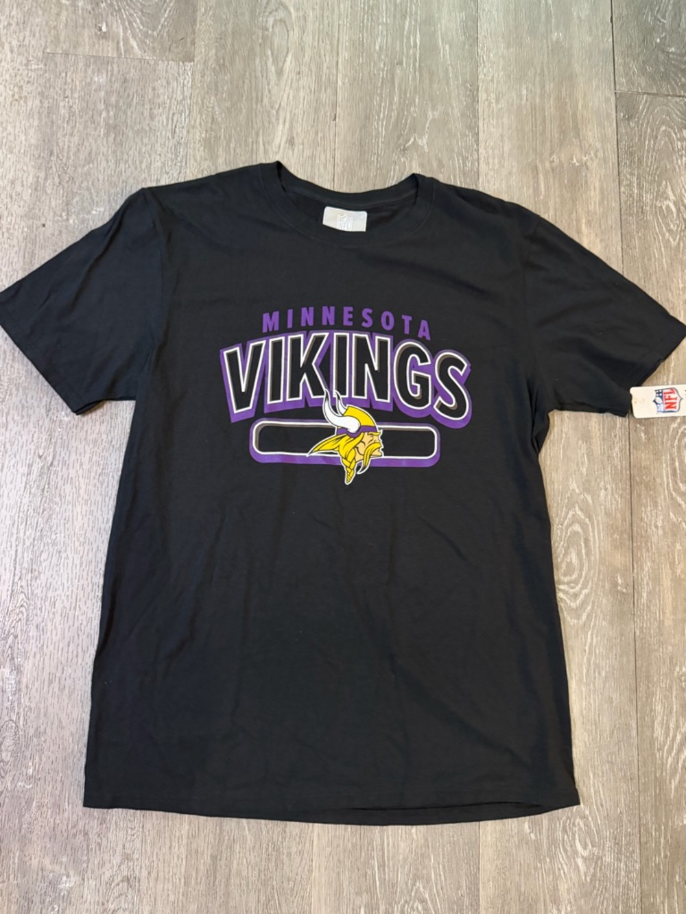 NFL Black T-Shirt with Purple and White Minnesota Lettering